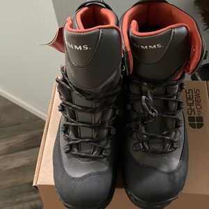 Simms felt sole wading boots.